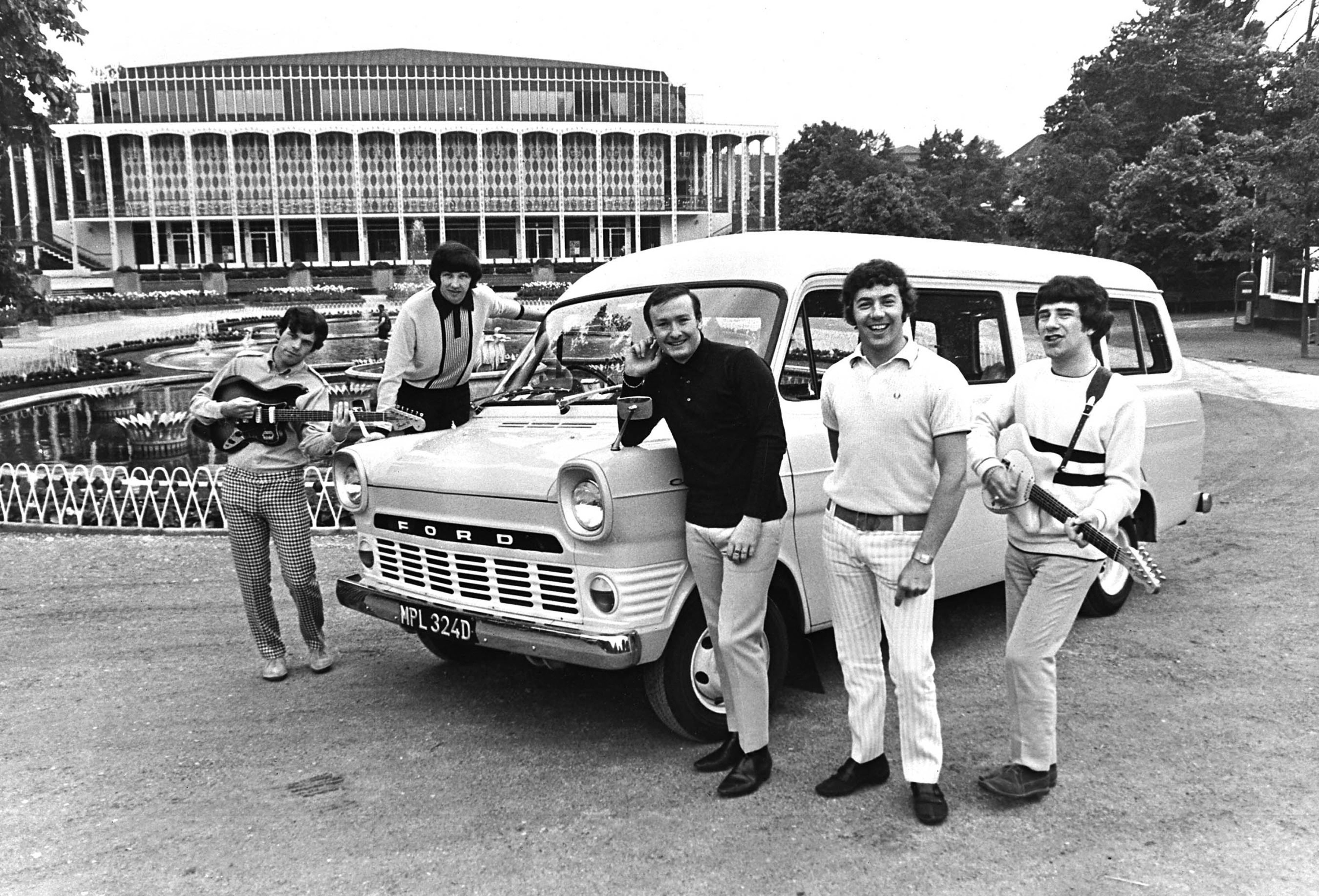 1966 – British pop band Brian Poole and the Tremeloes with their petrol-powered Transit minibus.